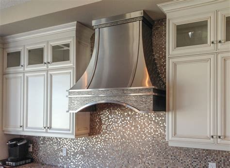 cream kitchen cabinets with stainless steel oven hood|cream kitchen cabinets.